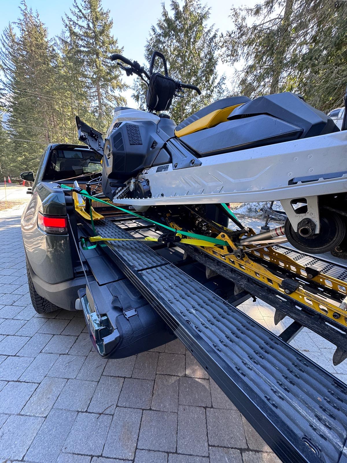 Rivian R1T R1S Snowmobile in R1T bed with deck / bed extender -- fits and performs well IMG_1996