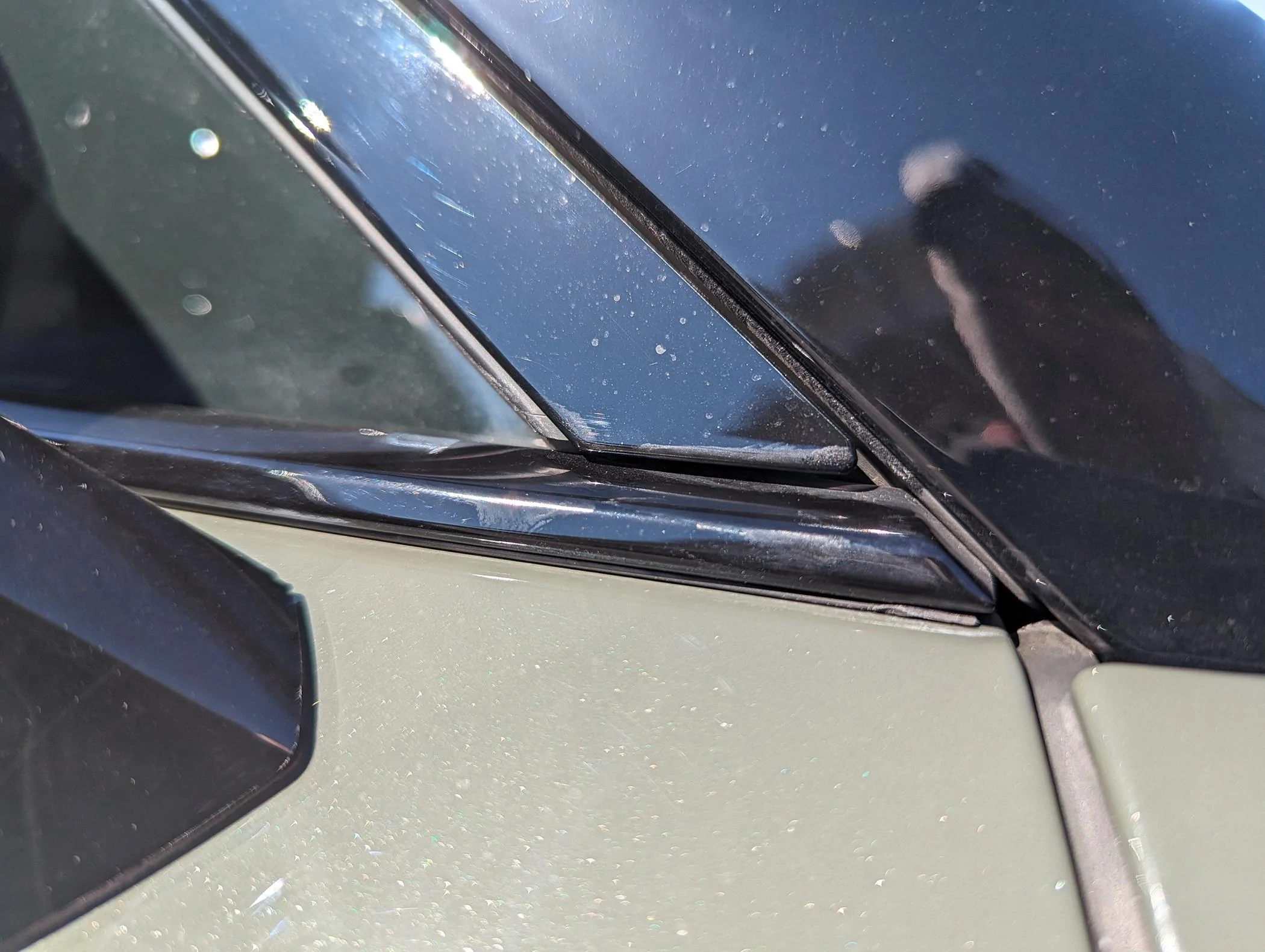 Rivian R1T R1S Resolved (my) excessive wind noise 2023 R1T (cause: corner window plastic trim) PXL_20240324_185203178
