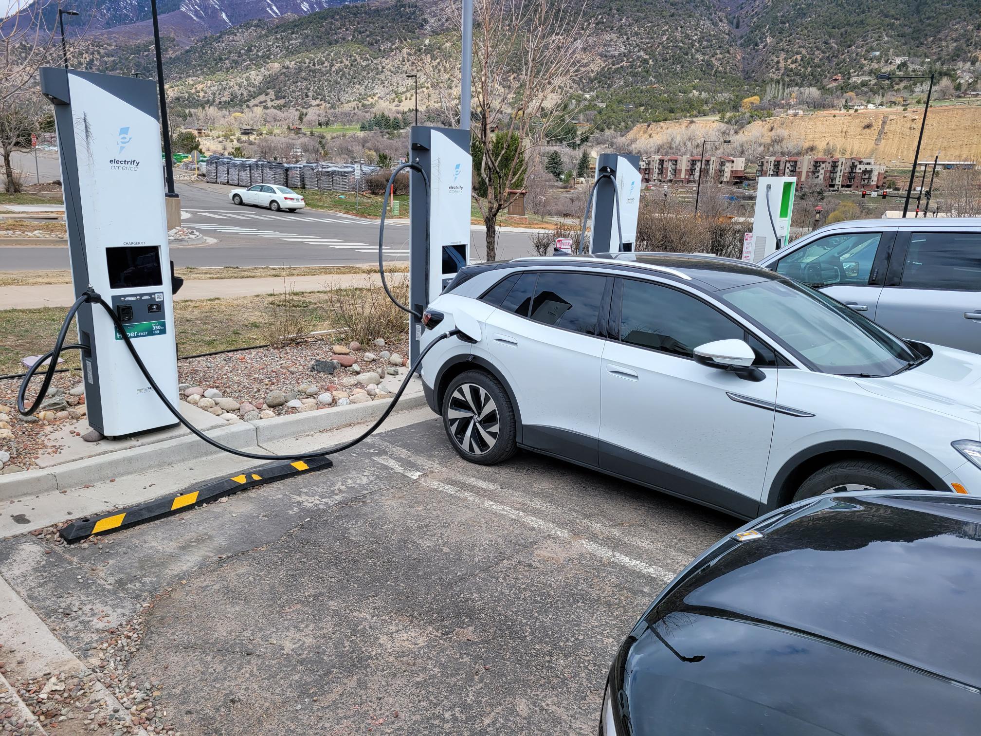 Rivian R1T R1S Let's talk Tesla Supercharger parking etiquette... EV-DumAss1