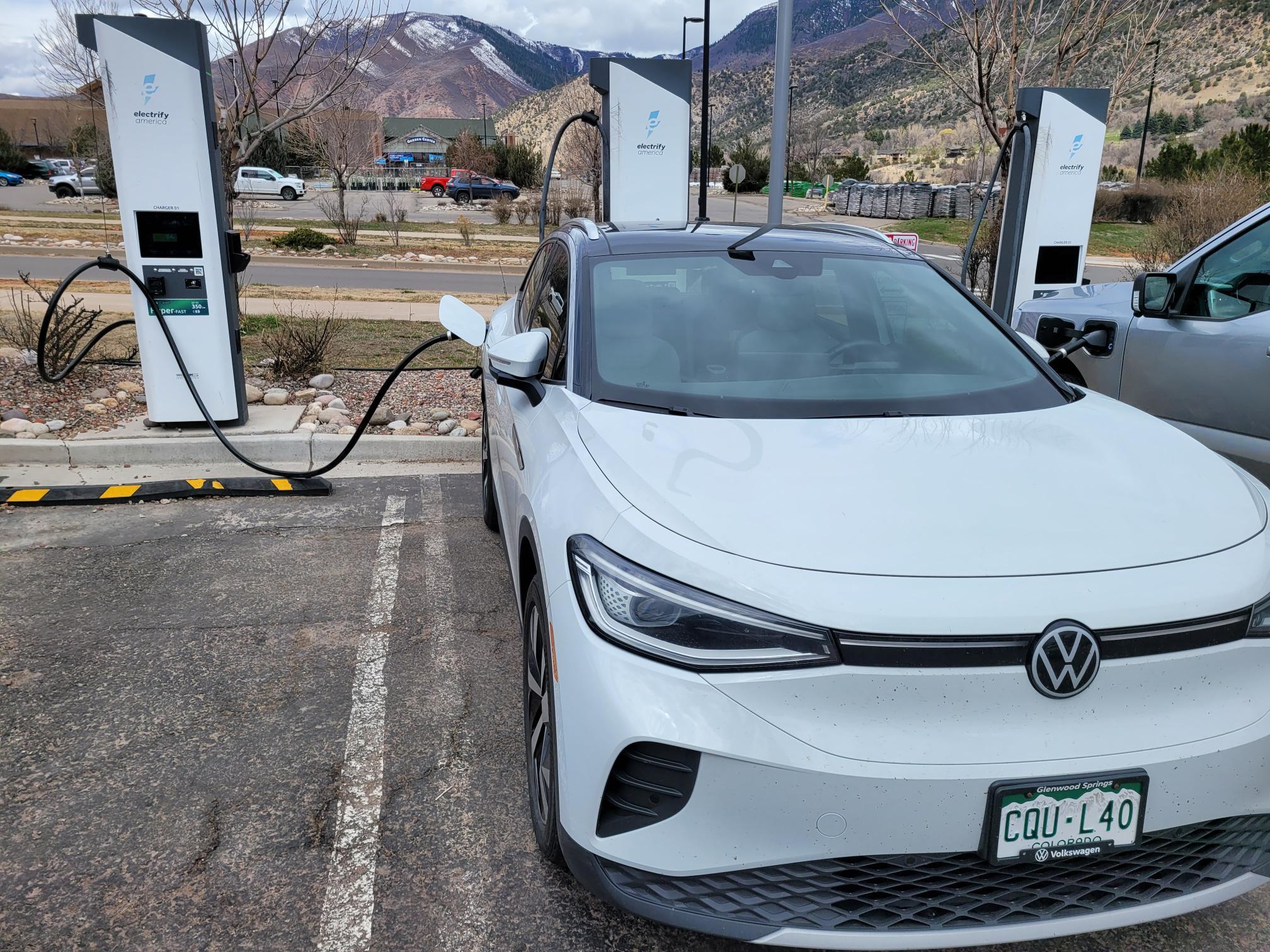 Rivian R1T R1S Let's talk Tesla Supercharger parking etiquette... EV-DumAss2