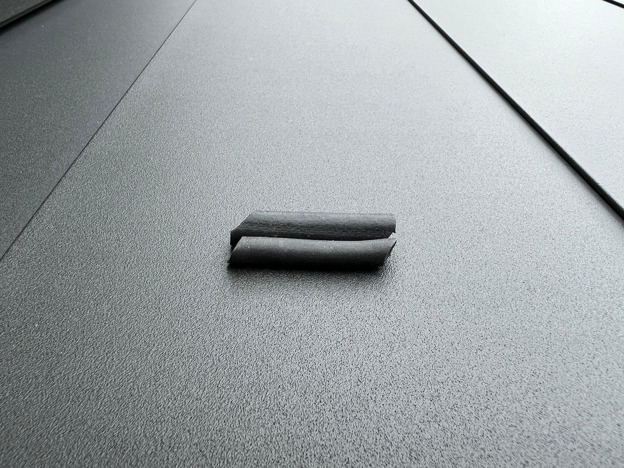 Rivian R1T R1S Resolved (my) excessive wind noise 2023 R1T (cause: corner window plastic trim) IMG_2129.JPG