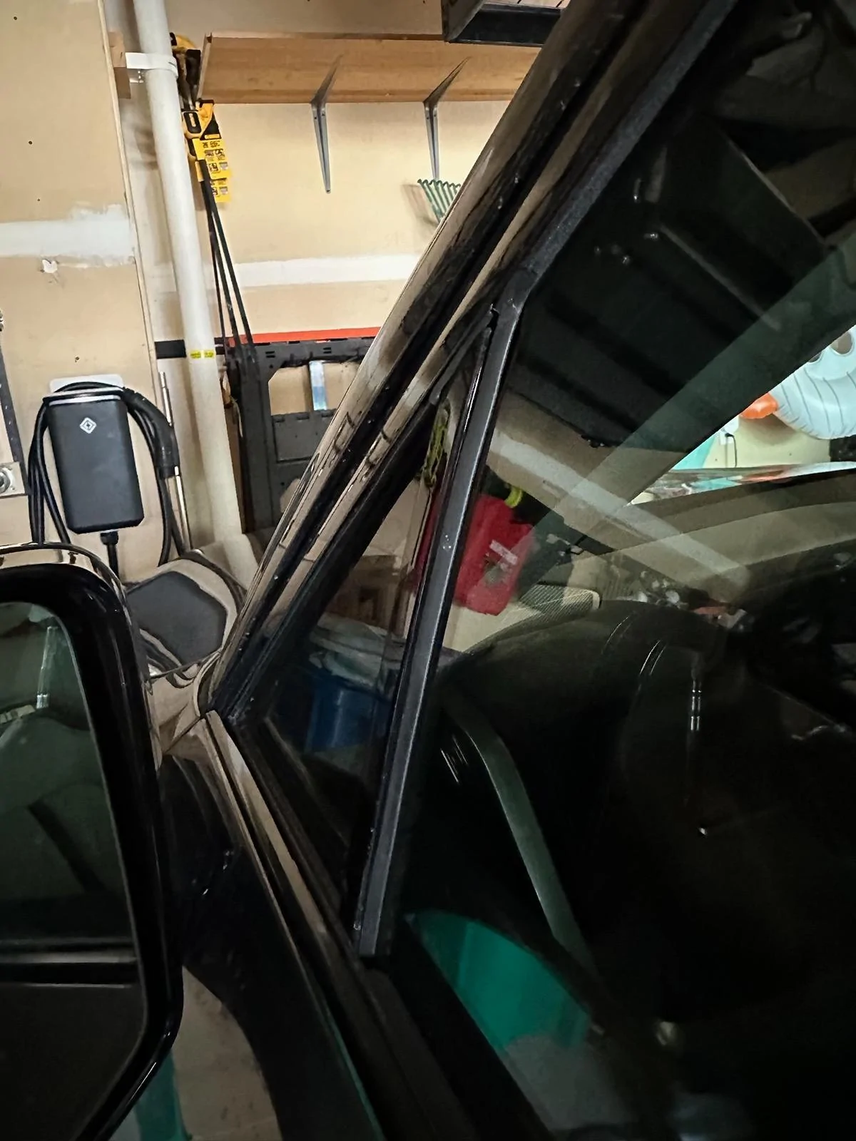 Rivian R1T R1S Resolved (my) excessive wind noise 2023 R1T (cause: corner window plastic trim) IMG_3298