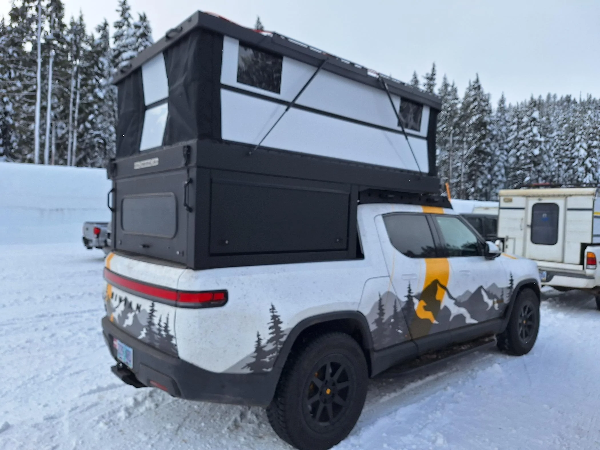Rivian R1T R1S Rivian R1T with a camper spotted…. 20240313_105155