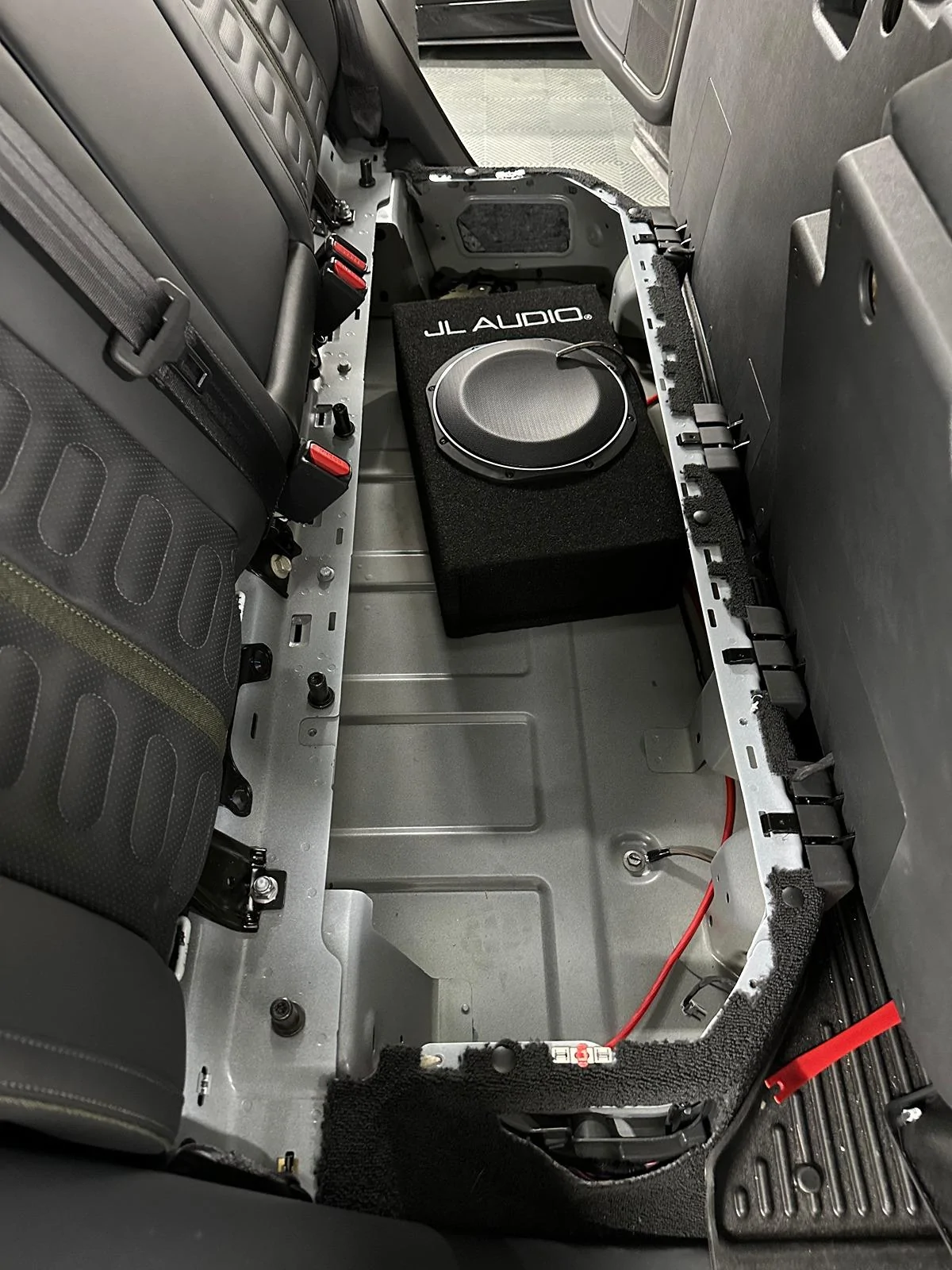 Rivian R1T R1S Simple 10" JL Subwoofer Install in R1T IMG_2558