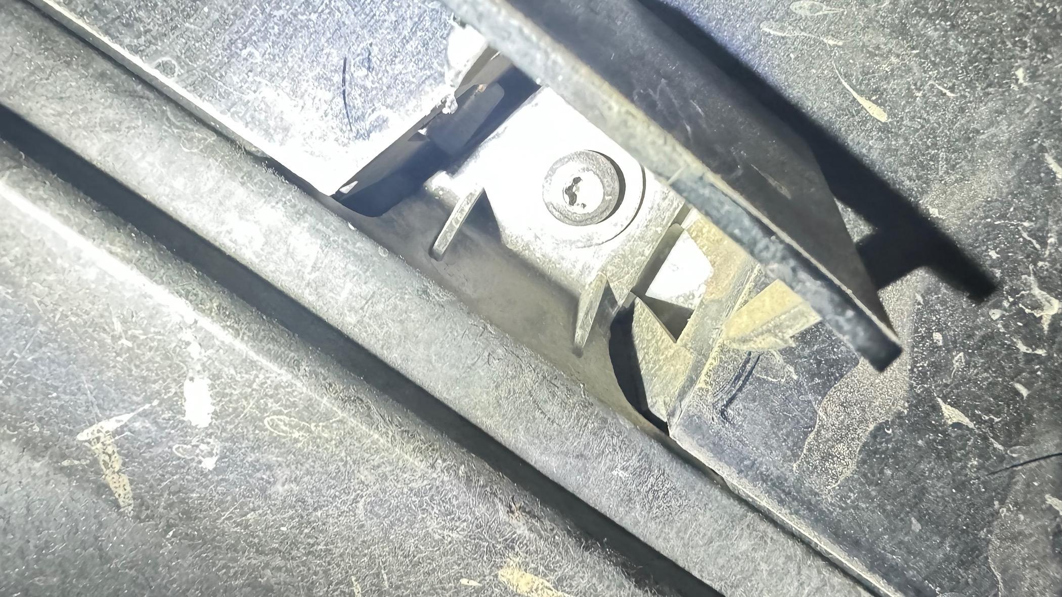 Rivian R1T R1S Hanging plastic tabs at rear undercarriage? IMG_0212