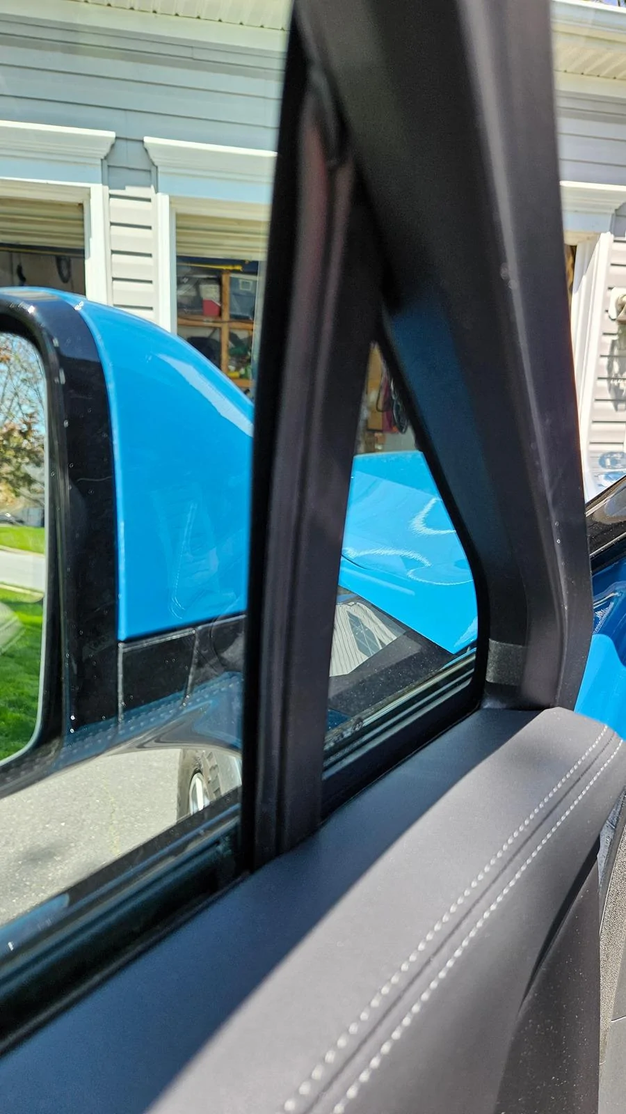 Rivian R1T R1S Resolved (my) excessive wind noise 2023 R1T (cause: corner window plastic trim) 1000014822