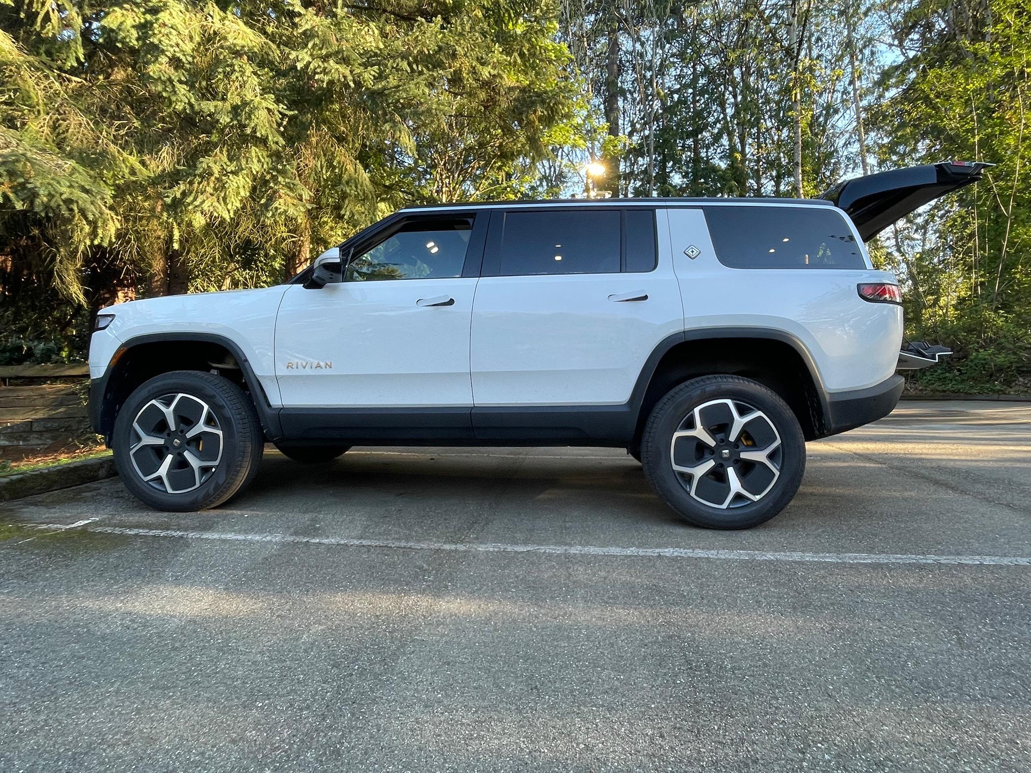 Rivian R1T R1S Camping mode auto leveling in parking lot - fun snack time IMG_7415