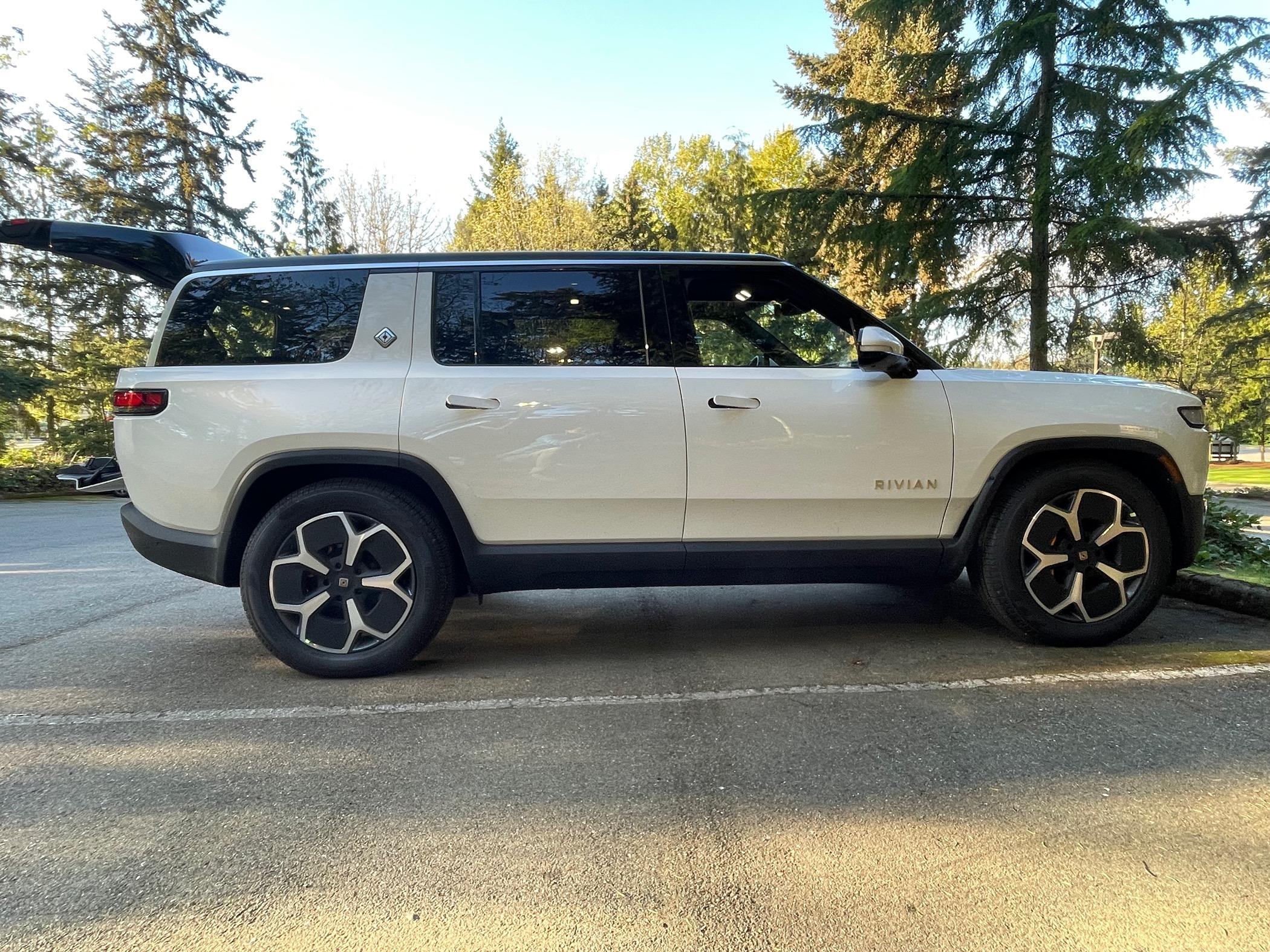 Rivian R1T R1S Camping mode auto leveling in parking lot - fun snack time IMG_7417