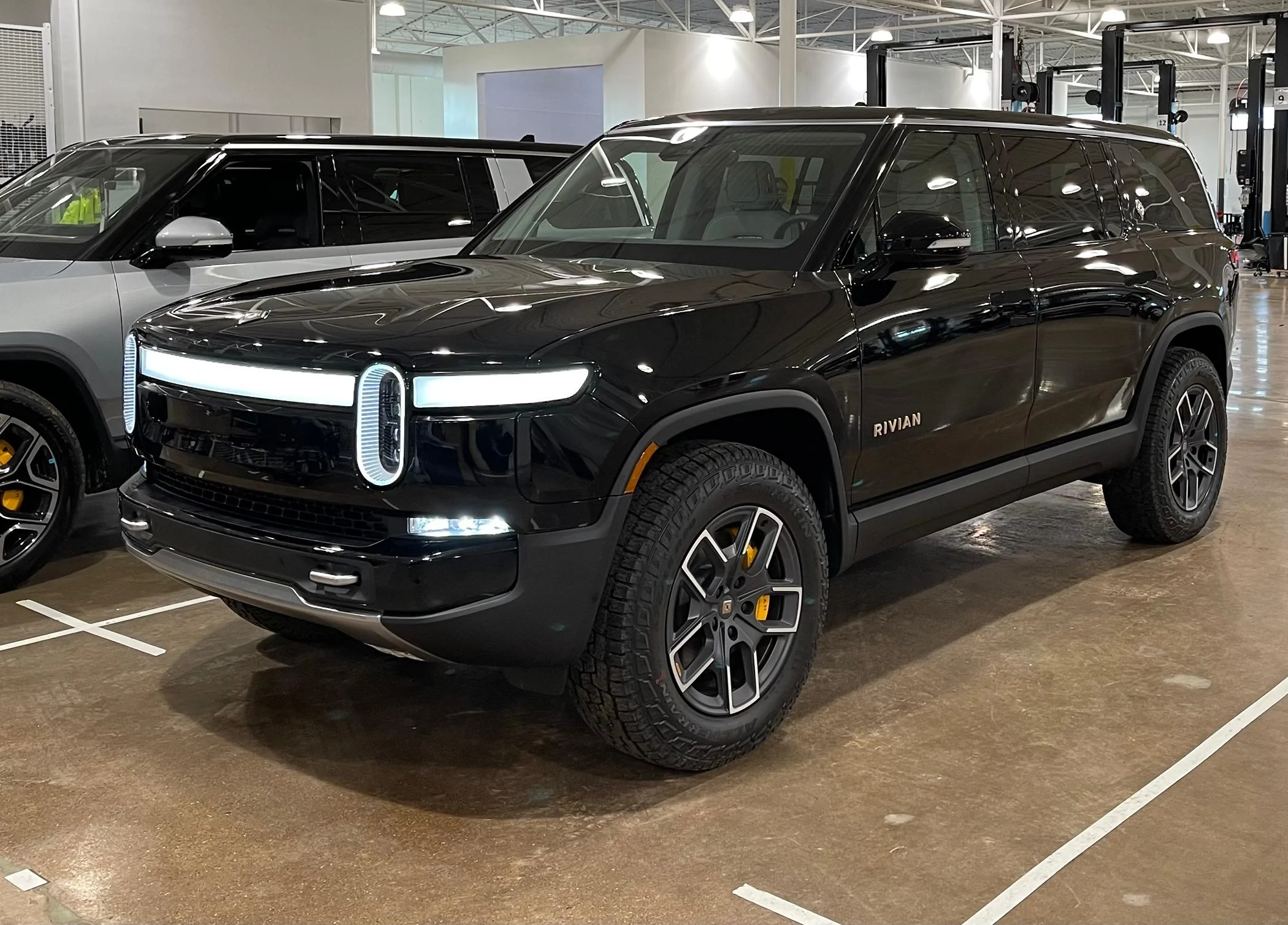 Rivian R1T R1S Small Dent Near Logo at Delivery - How to Handle Possible Big Repair? img_0448-jpeg