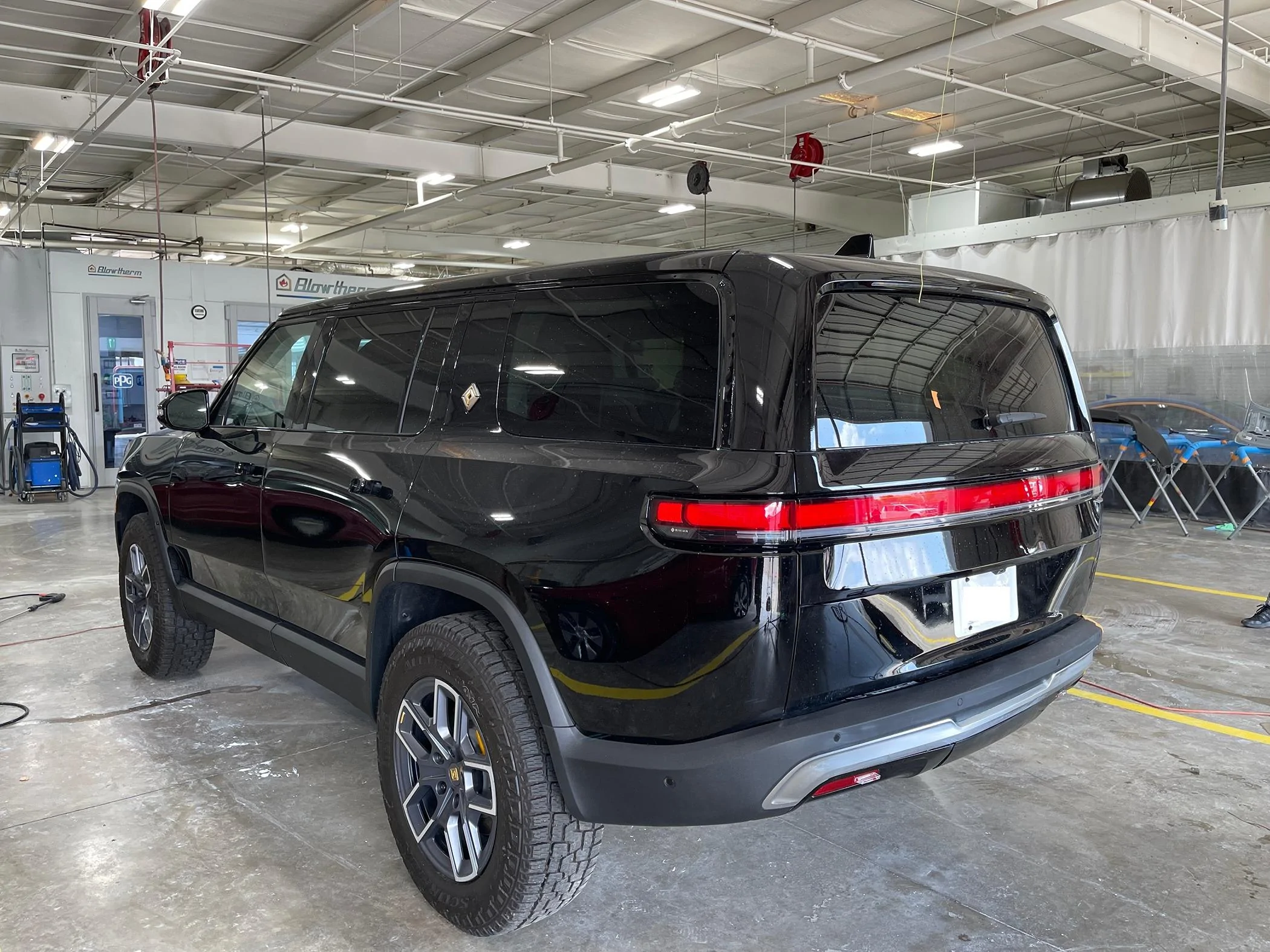 Rivian R1T R1S Small Dent Near Logo at Delivery - How to Handle Possible Big Repair? RIVN Repair