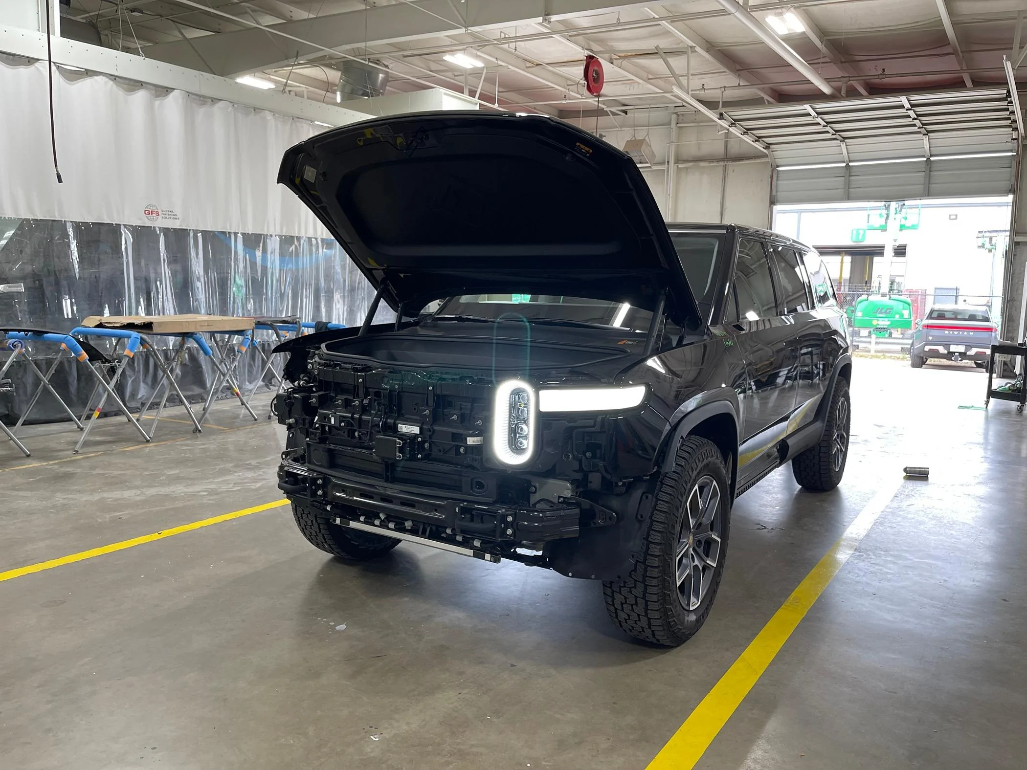 Rivian R1T R1S Small Dent Near Logo at Delivery - How to Handle Possible Big Repair? IMG_4864