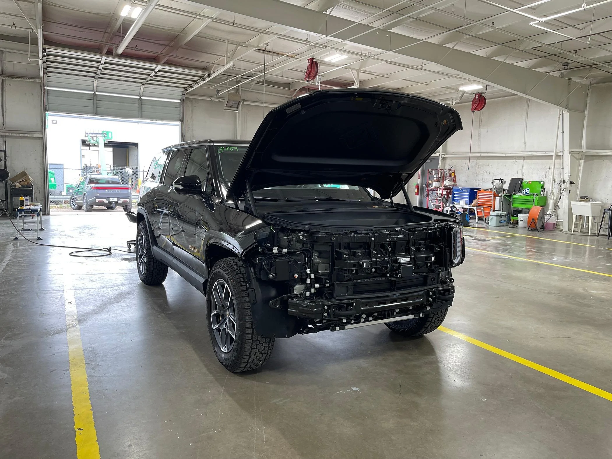 Rivian R1T R1S Small Dent Near Logo at Delivery - How to Handle Possible Big Repair? IMG_4873