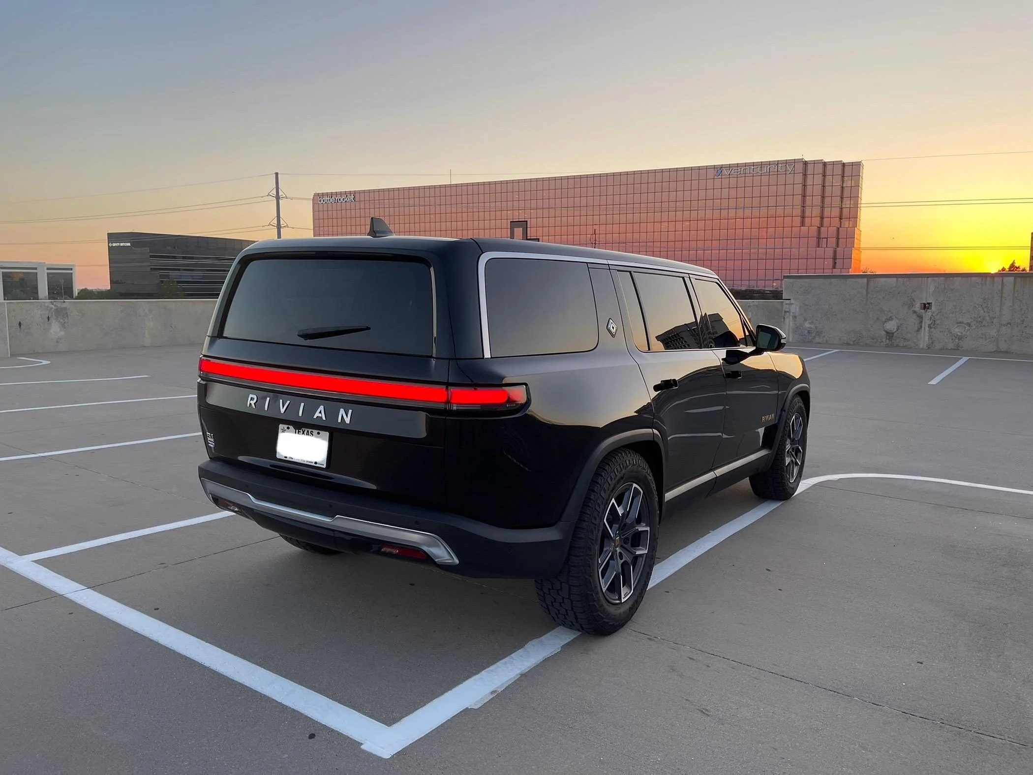 Rivian R1T R1S Small Dent Near Logo at Delivery - How to Handle Possible Big Repair? IMG_9097