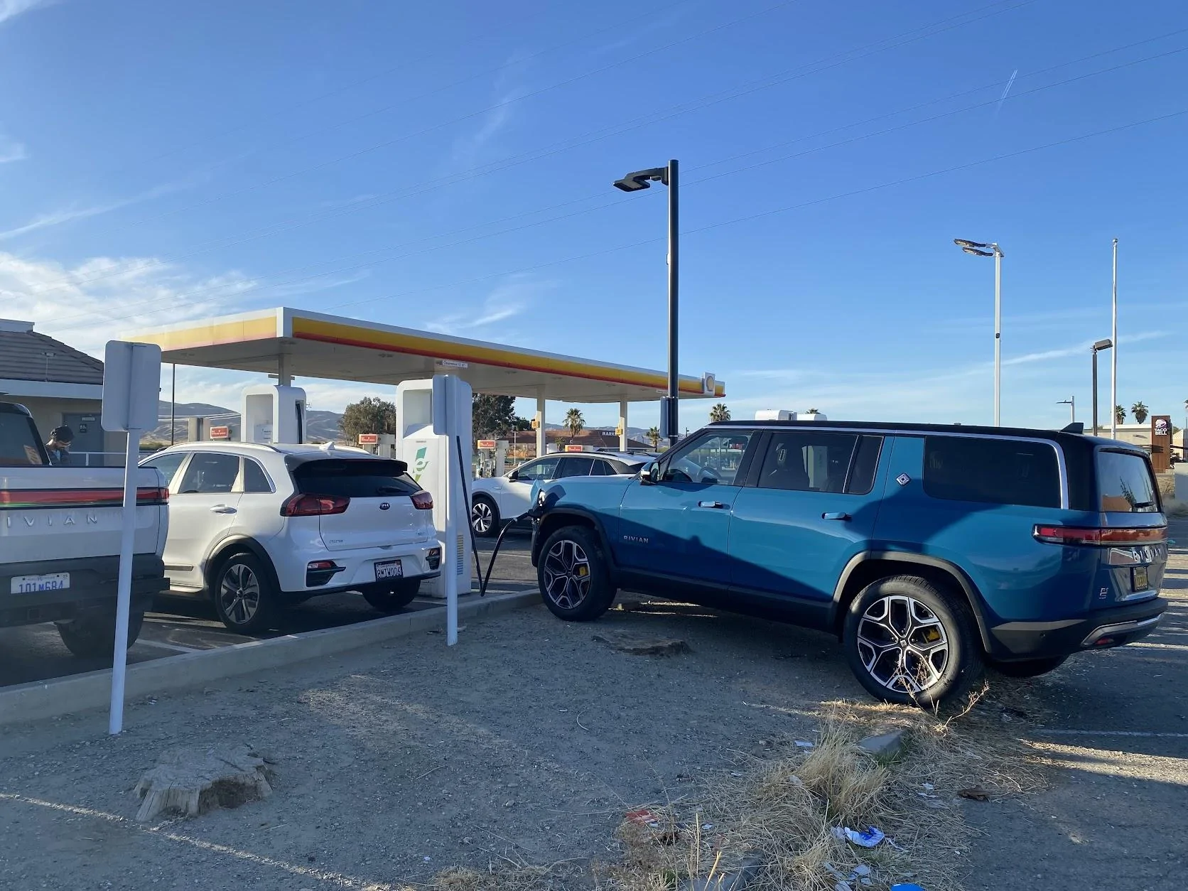 Rivian R1T R1S Strategic ways not to block two Tesla stations 561DC217-B7AD-4F43-B293-25762A218F15