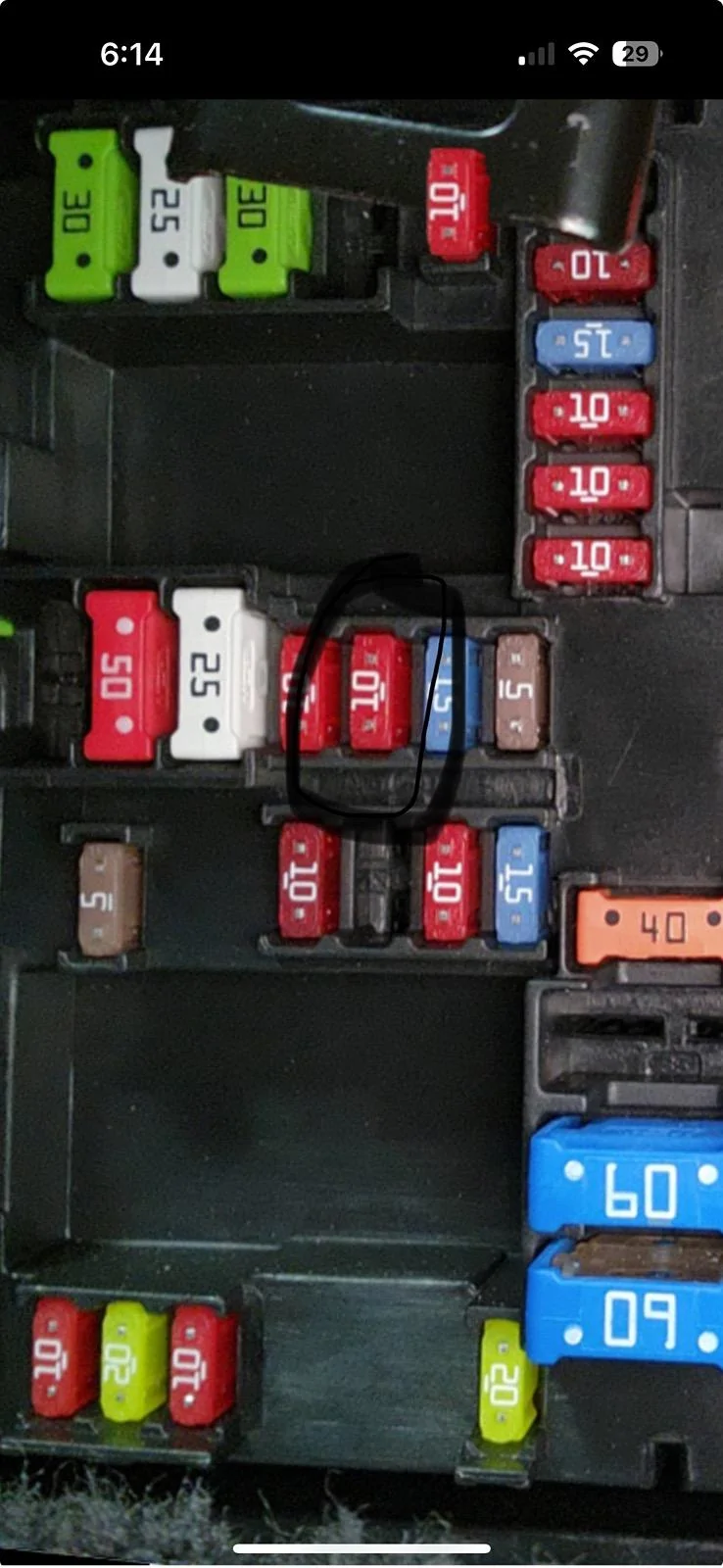 Rivian R1T R1S Interior passenger-side fuse box IMG_9268