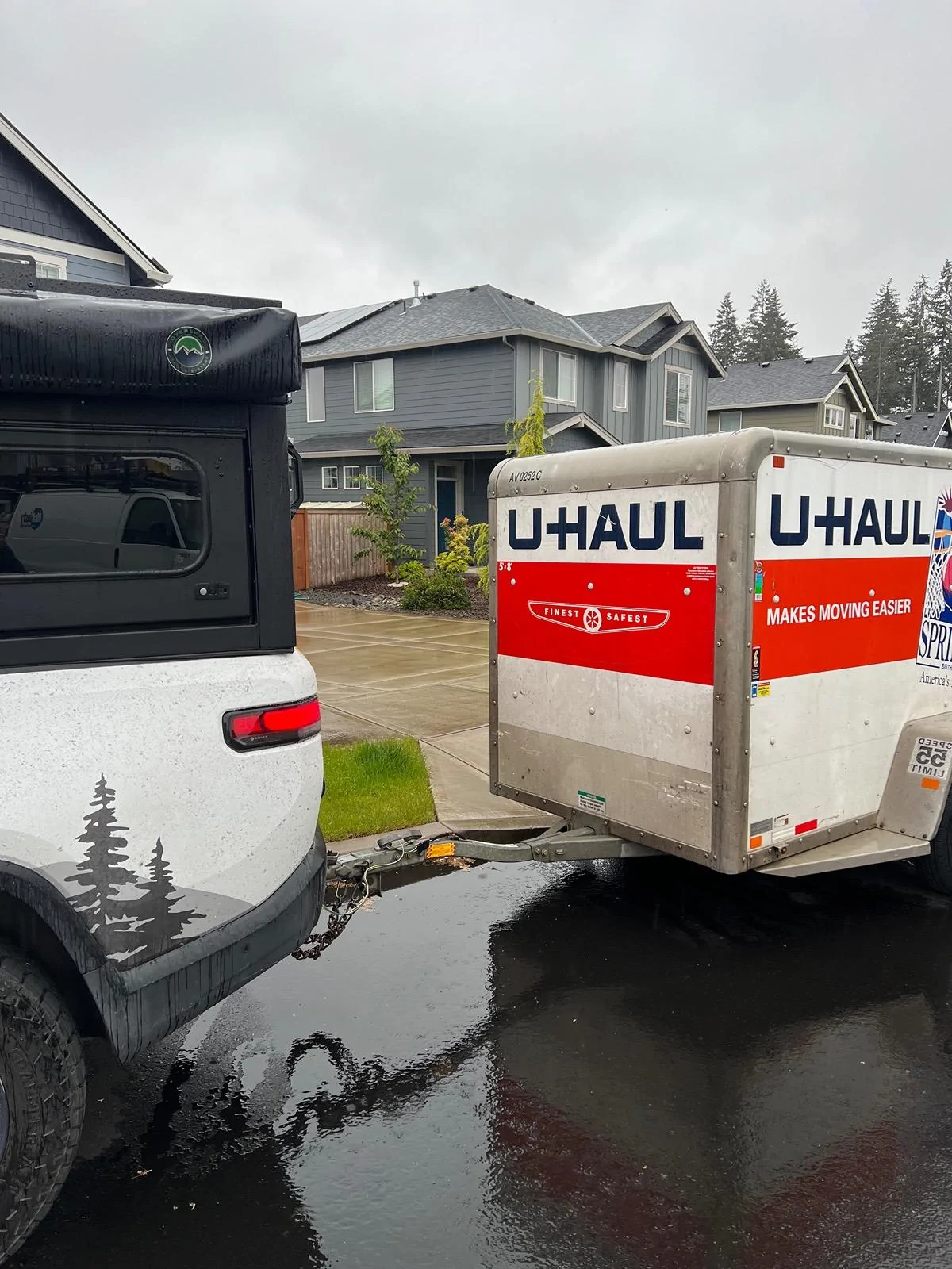 Rivian R1T R1S First towing experience with my R1T.  Uhaul 5X8 and camper shell installed. IMG_5670