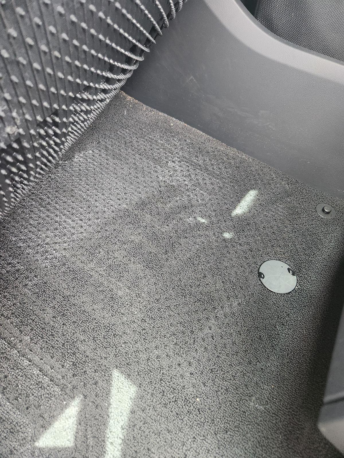 Rivian R1T R1S Wet spot under driver mat 20240514_133425