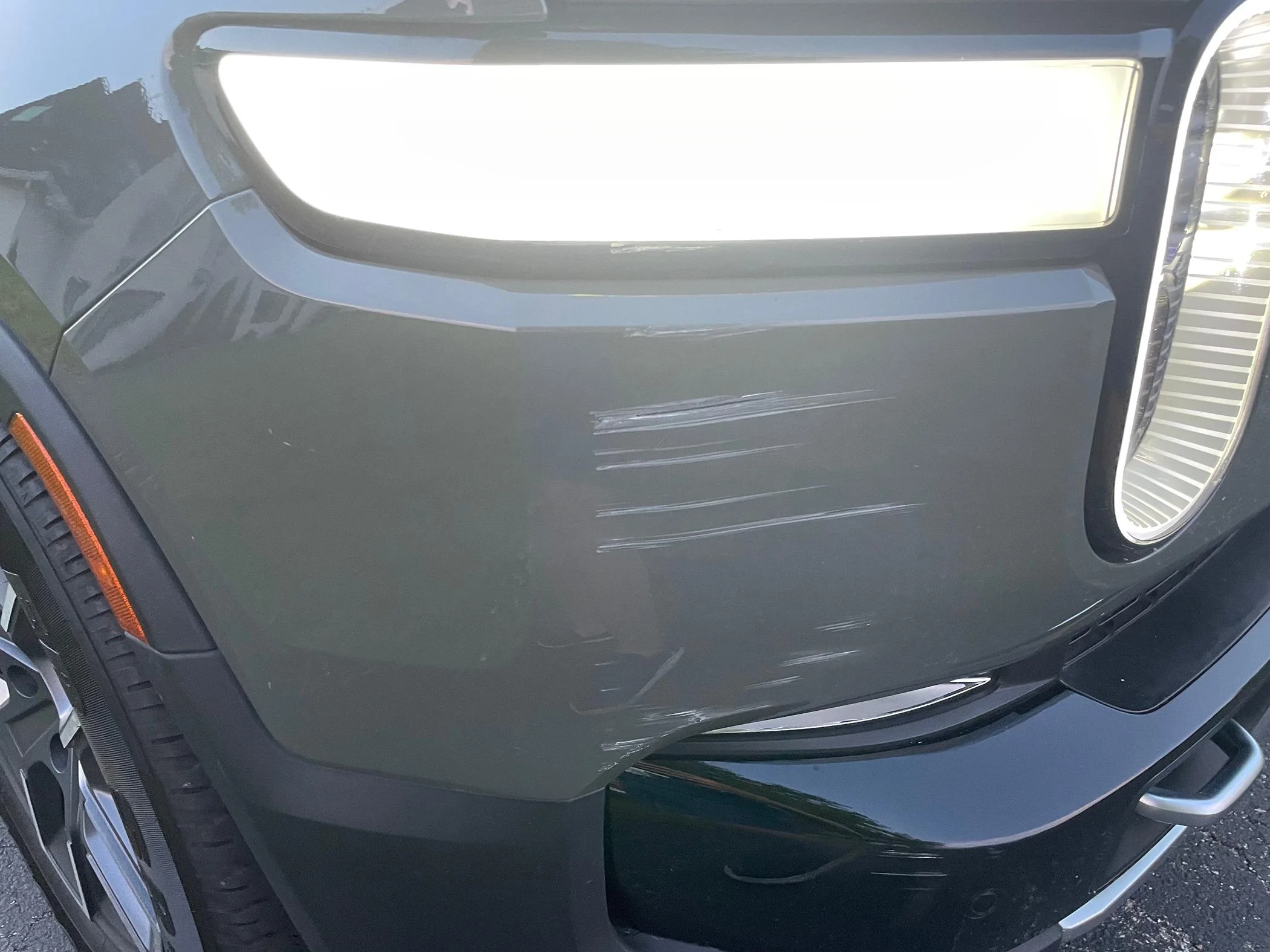 Rivian R1T R1S What 's the best way to deal with scratches like these? IMG_8476