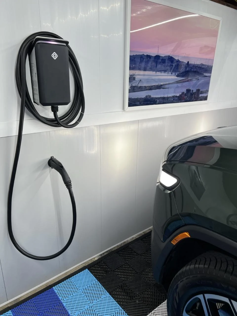 Rivian R1T R1S Show off your Level 2 Home Charger installs here charging plug holster