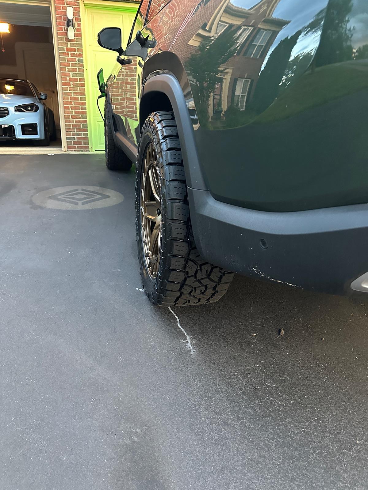 Rivian R1T R1S New rims and tires: 22" EV Sportline R500 forged wheels and Toyo Open Country III A/T 285/50-22 tires IMG_2068
