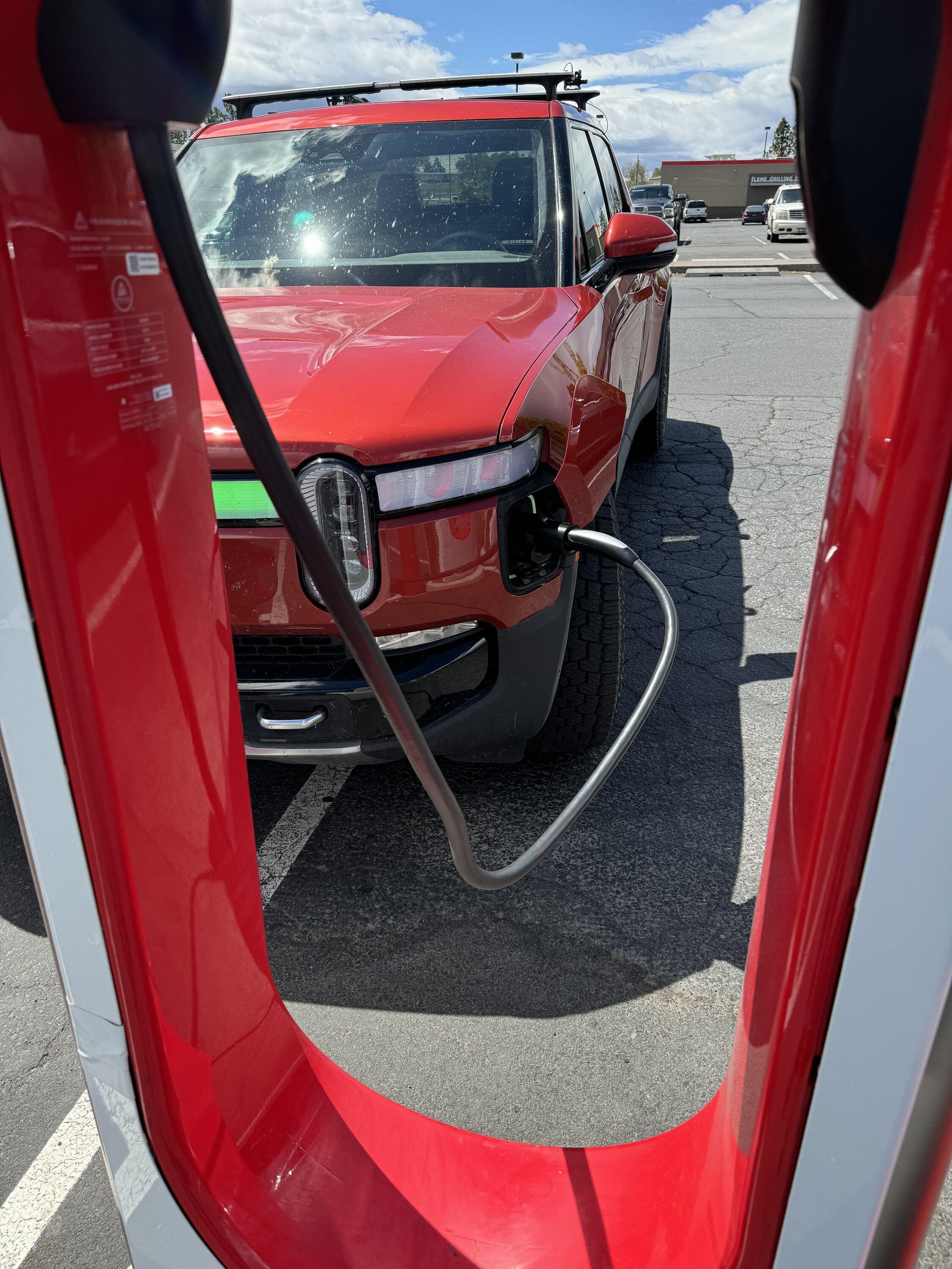 Rivian R1T R1S Pretty damn cool! Lectron adapter @ Tesla Supercharger IMG_2165