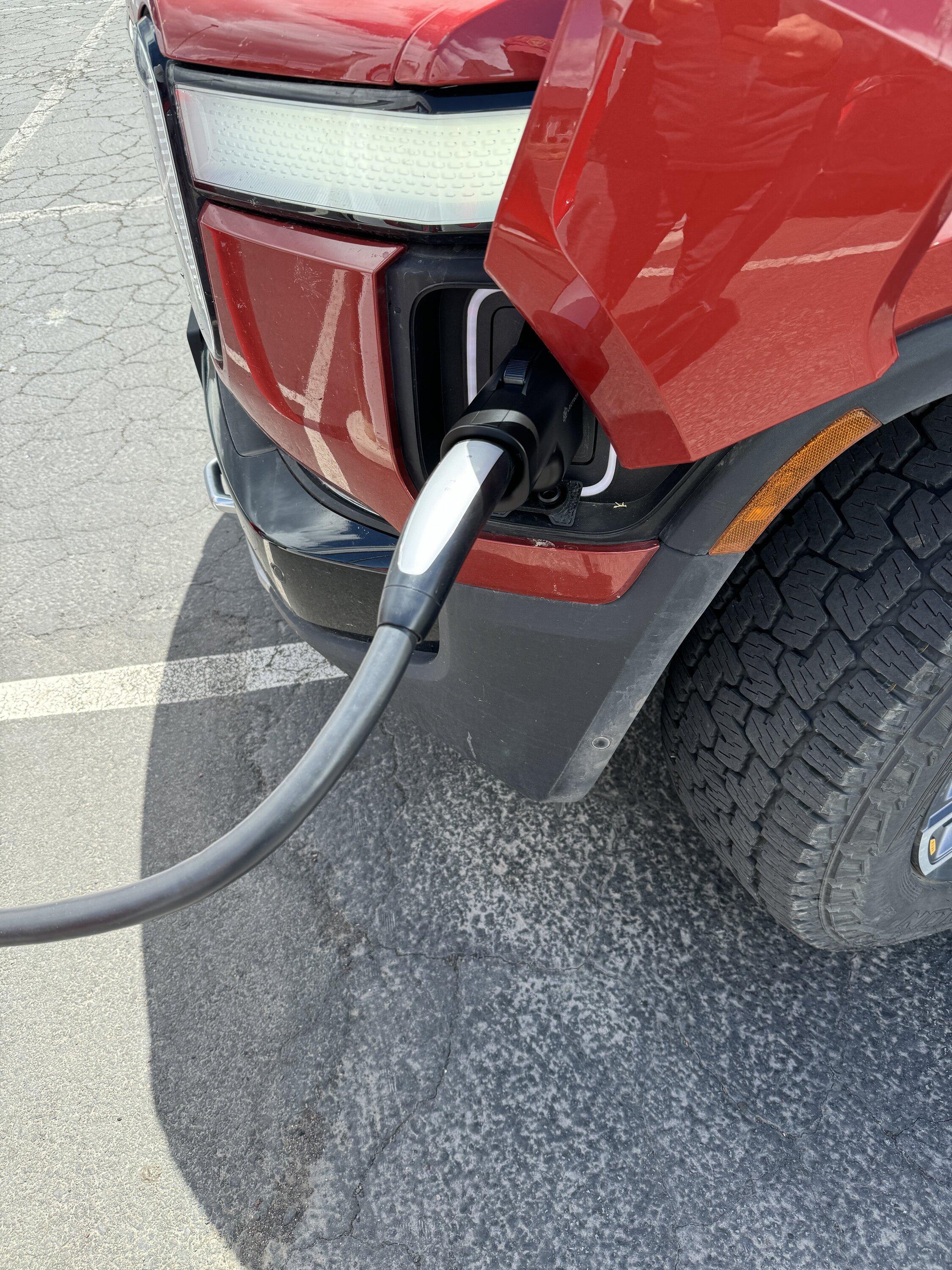 Rivian R1T R1S Pretty damn cool! Lectron adapter @ Tesla Supercharger IMG_2162