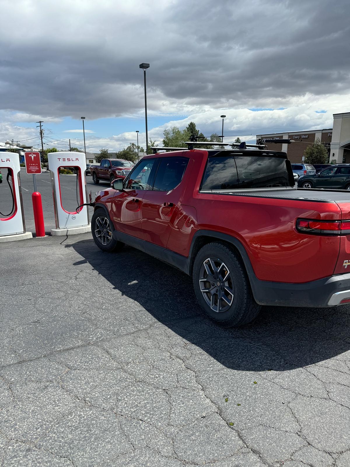 Rivian R1T R1S Pretty damn cool! Lectron adapter @ Tesla Supercharger IMG_2163