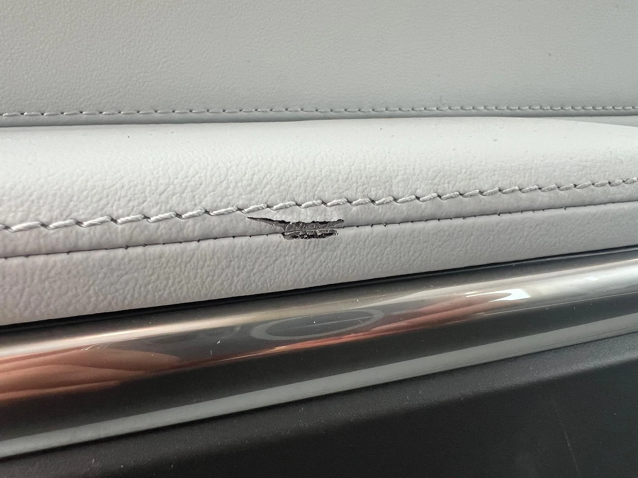 Rivian R1T R1S Fixing torn faux leather IMG_4591