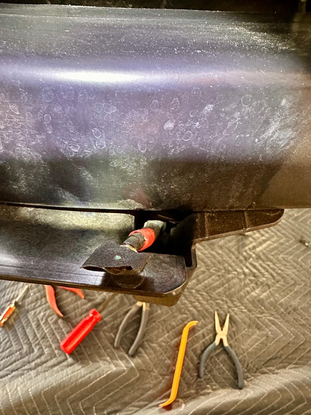 Rivian R1T R1S Unused cables in rear bumper IMG_1249
