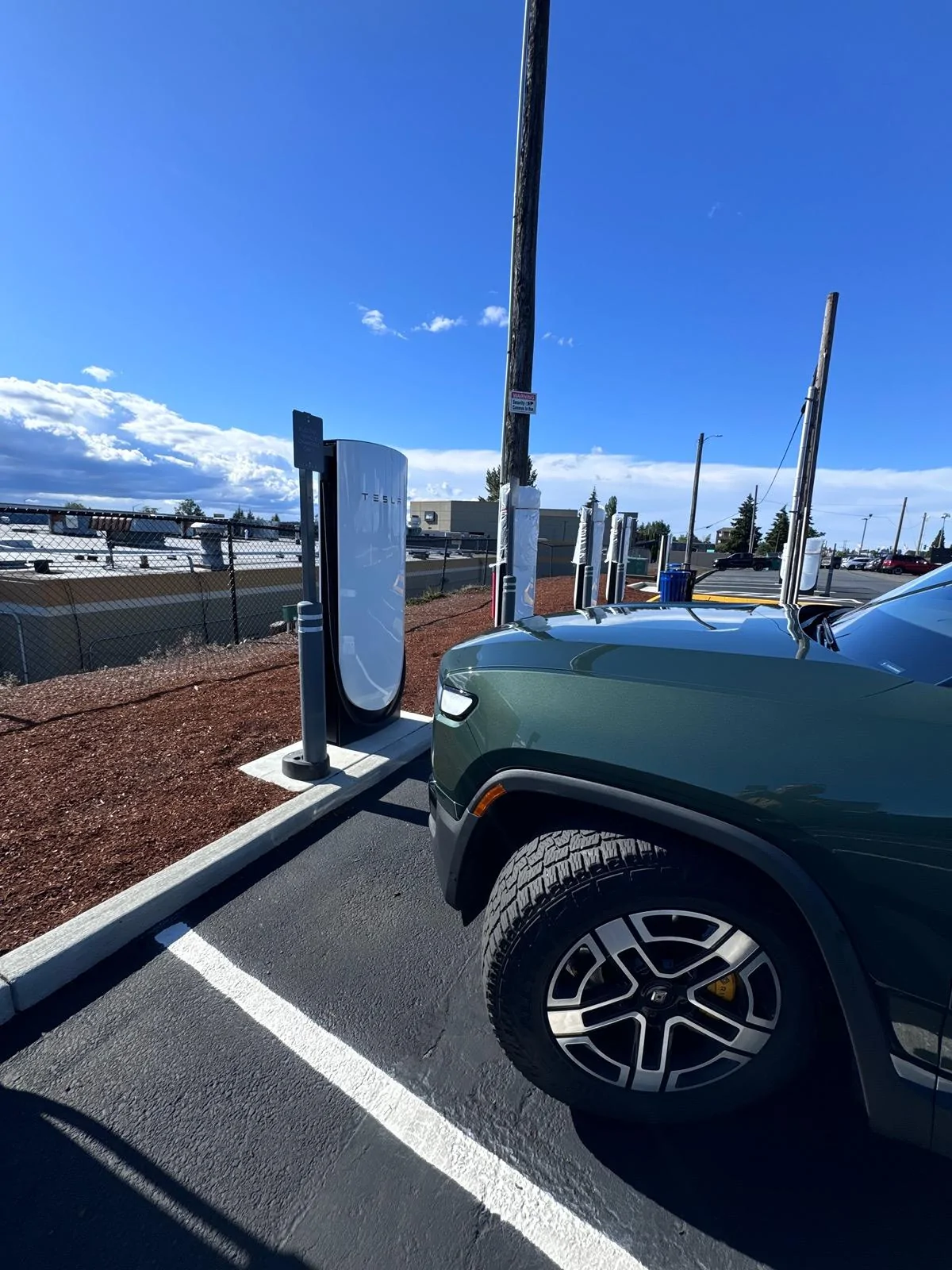 Rivian R1T R1S Tesla v4 Chargers in Tacoma WA IMG_2723