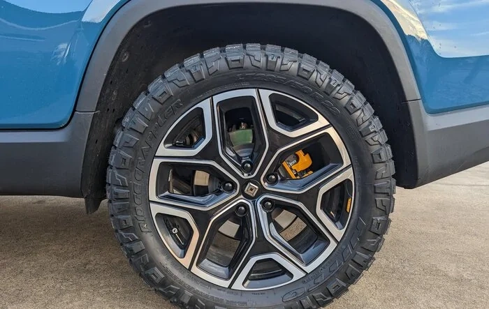 Nitto Ridge Grapplers tires (295/50/22) installed on 22” wheels on Rivian R1T
