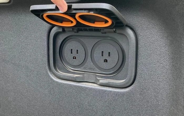 Rivian R1T Bed Outlet Saves Power Outage Day -- charges  battery charger for natural gas generator