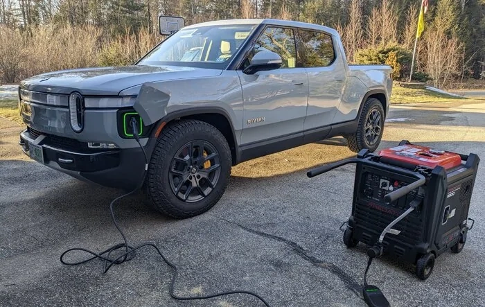 It's a hybrid now... R1T charged at 5.2kw with portable generator and charging adapter