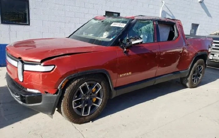 Salvage Rivan R1T on Copart -  Canyon Red R1T Adventure Edition