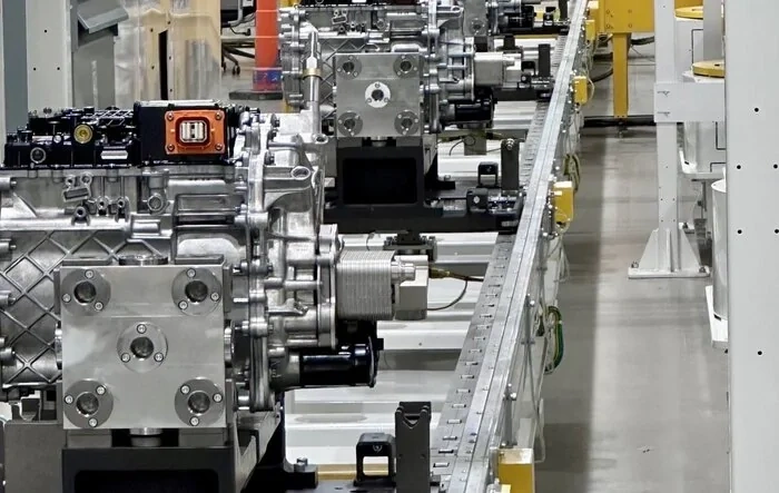 RJ shows "Ramping production of our new [Dual-Motor R1] Enduro drive unit"