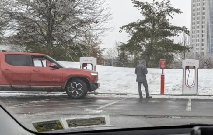 First Tesla Supercharger with "Magic Dock" CCS adapter successfully charged a R1T. This is fantastic!