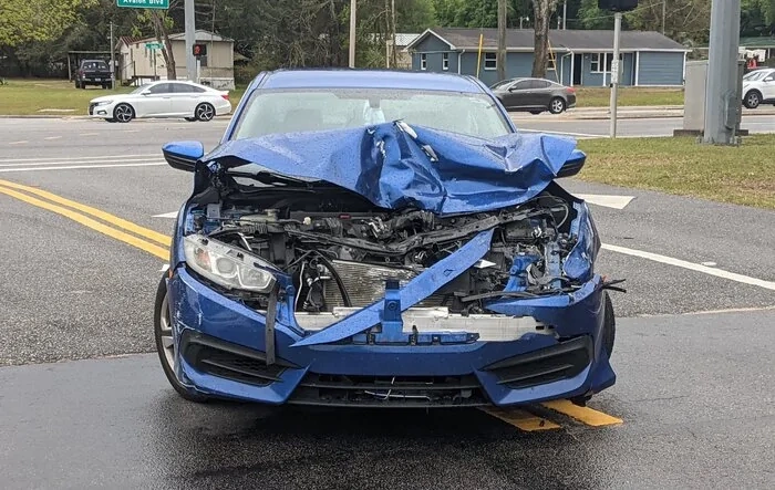Damage results from 7K lbs R1T vs Civic in collision