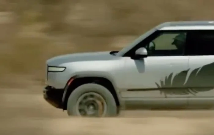 Jeff Bezos behind the wheel of an R1T in Blue Origin video