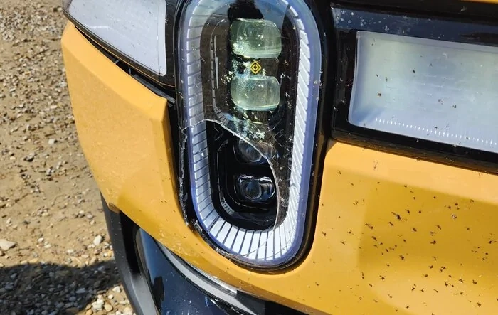 One-eyed R1T :( Headlight broken by a Jeep