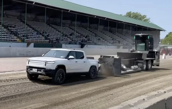 Team Venom Racing R1T "Volt-Tron" in pulling events vs Chevrolet 1/2 and 3/4 ton trucks