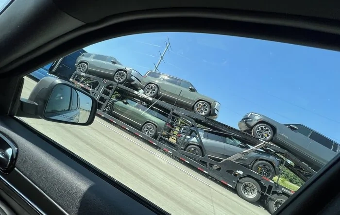 Lots of R1S's spotted being delivered to Minneapolis Service Center today!