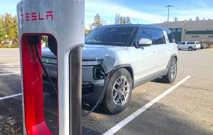 Tesla Magic Dock Supercharger install crew uses Rivian as test vehicle in Alaska