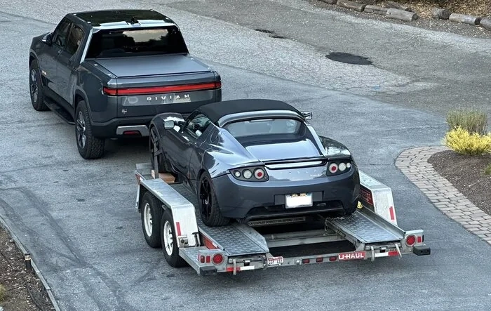 Sometimes you have to give a Tesla a lift / tow ...