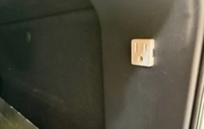 Added 110v outlet on passenger side of R1T gear tunnel