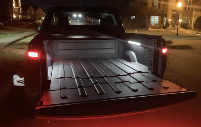 Video of R1T lights at night - headlights, tail lights, turn signals, interior, frunk, bed, lock/unlock