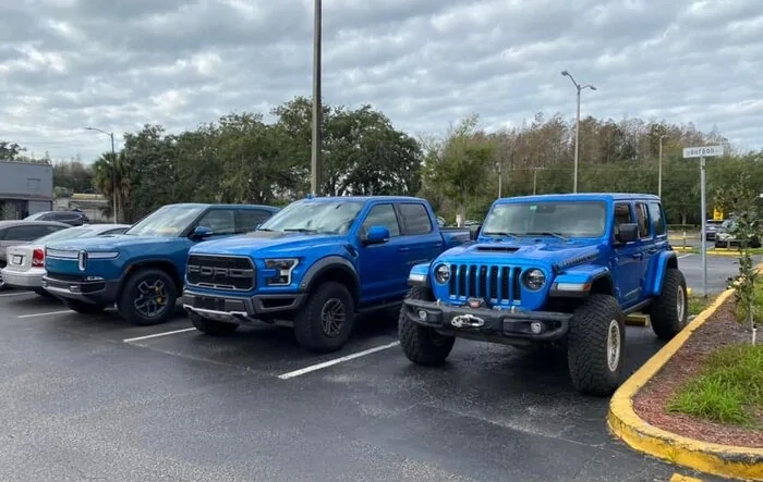 Rivian R1T vs F-150 Raptor vs Jeep Wrangler side-by-side