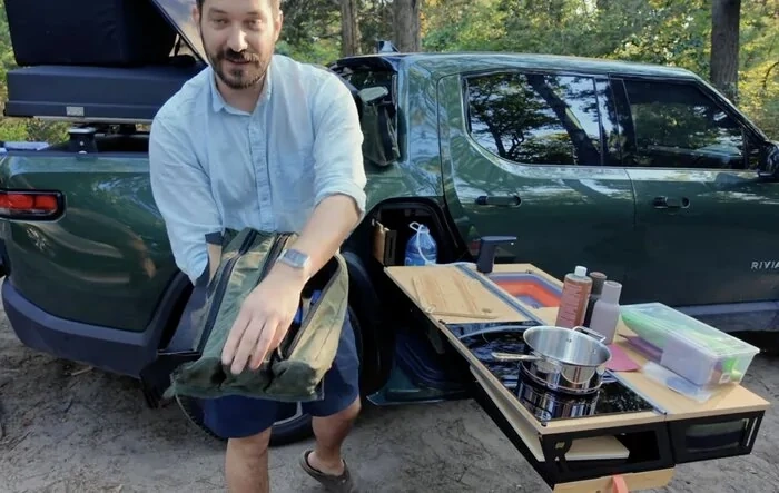 R1T camping & cooking adventure featuring gear tunnel Thunderbolt Camp Kitchen