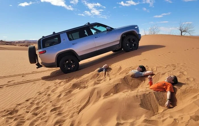 Playing in the sand at the White Wash sand dunes
