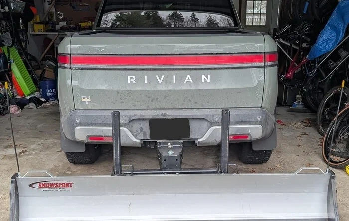 Snowsport HD Snow Plow mounted on rear hitch of R1T