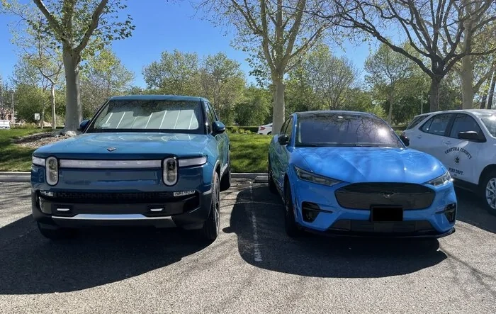 Rivian Blue R1T vs Grabber Blue Mach-E GT a side by side comparison look